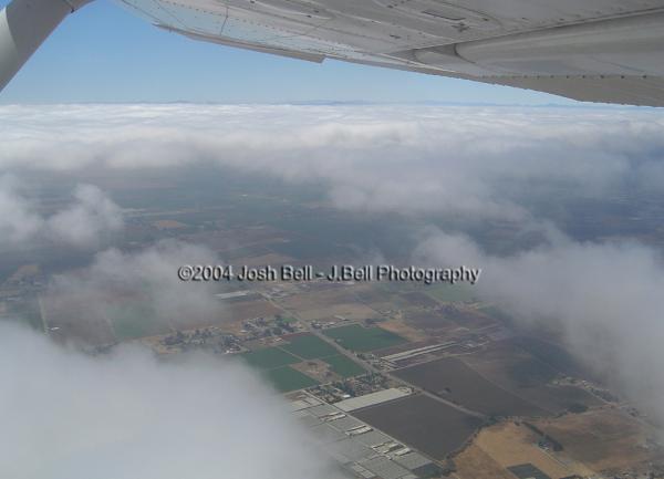 A peek through the clouds - Reed Hillview Airport - KRHV
